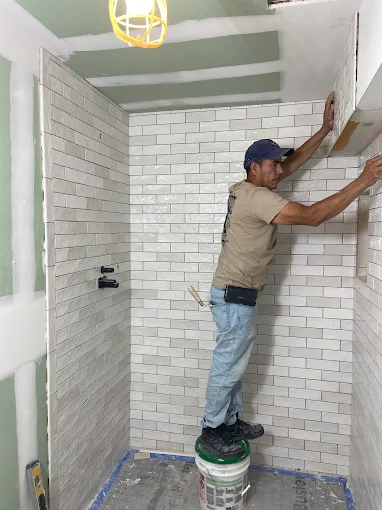 Professional tile installation for bathroom renovation